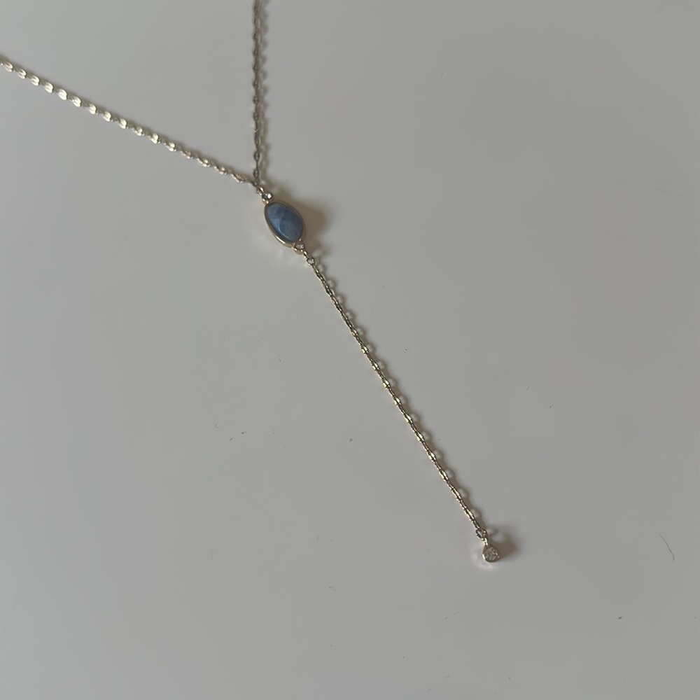 Dainty gold necklace with blue stone